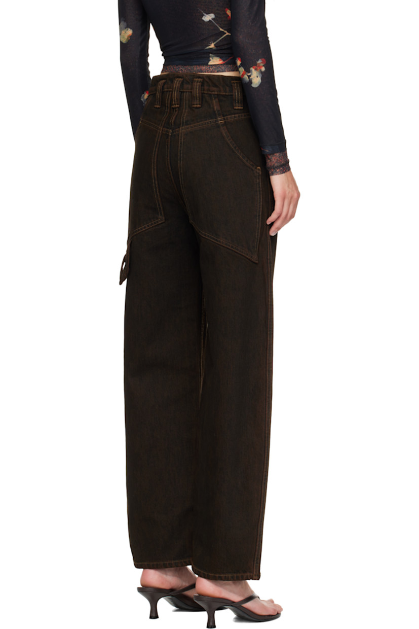 Stonewashed 14 oz non-stretch denim jeans. 

· Fading throughout 
· Wide-leg 
· Belt loops
· Four-pocket styling
· Zip fly 
· Hammer loop at back pocket 
· Contrast stitching in beige

Supplier color: Mud