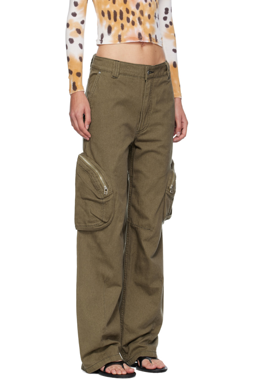 Non-stretch denim jeans.

· Belt loops
· Four-pocket styling
· Zip fly 
· Darts at legs
· Cargo pocket at outseams
· Contrast stitching in black

Supplier color: Earth