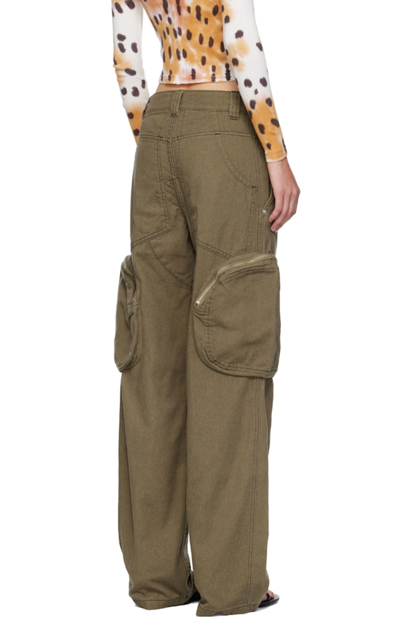 Non-stretch denim jeans.

· Belt loops
· Four-pocket styling
· Zip fly 
· Darts at legs
· Cargo pocket at outseams
· Contrast stitching in black

Supplier color: Earth