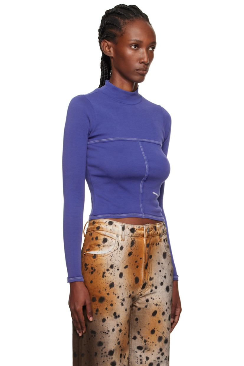 Rib-knit cotton turtleneck.

· Raw edges throughout
· Paneled construction
· Logo printed at front
· Cropped hem
· Contrast stitching in white

Supplier color: Ultramarine