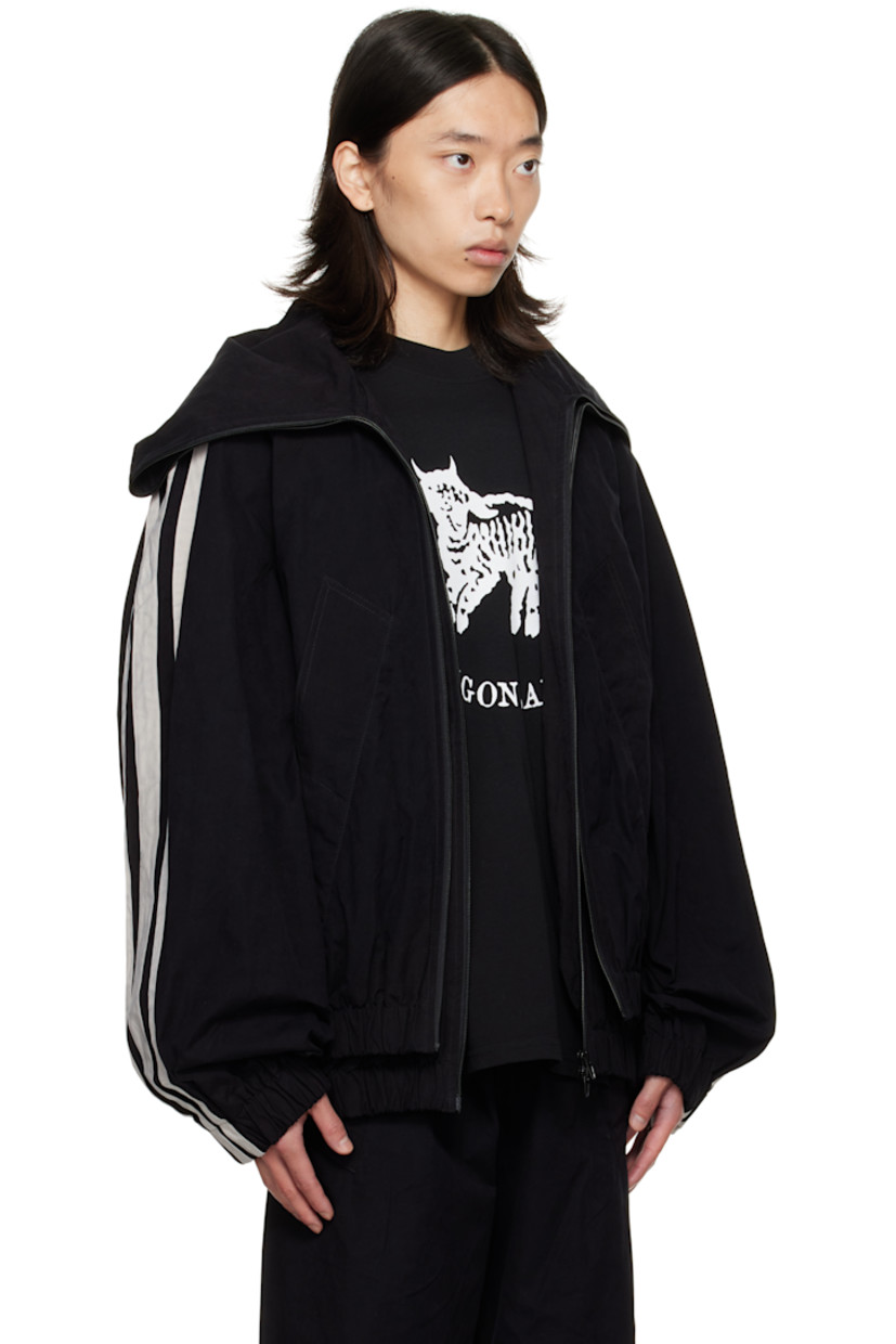 Cotton-blend broadcloth track jacket. 

· Layered construction 
· Modified stand collar 
· Two-way zip closure 
· Welt pockets at front 
· Elasticized hem and cuffs
· Stripe appliqué at raglan sleeves
· Full satin lining 

Supplier color: Black