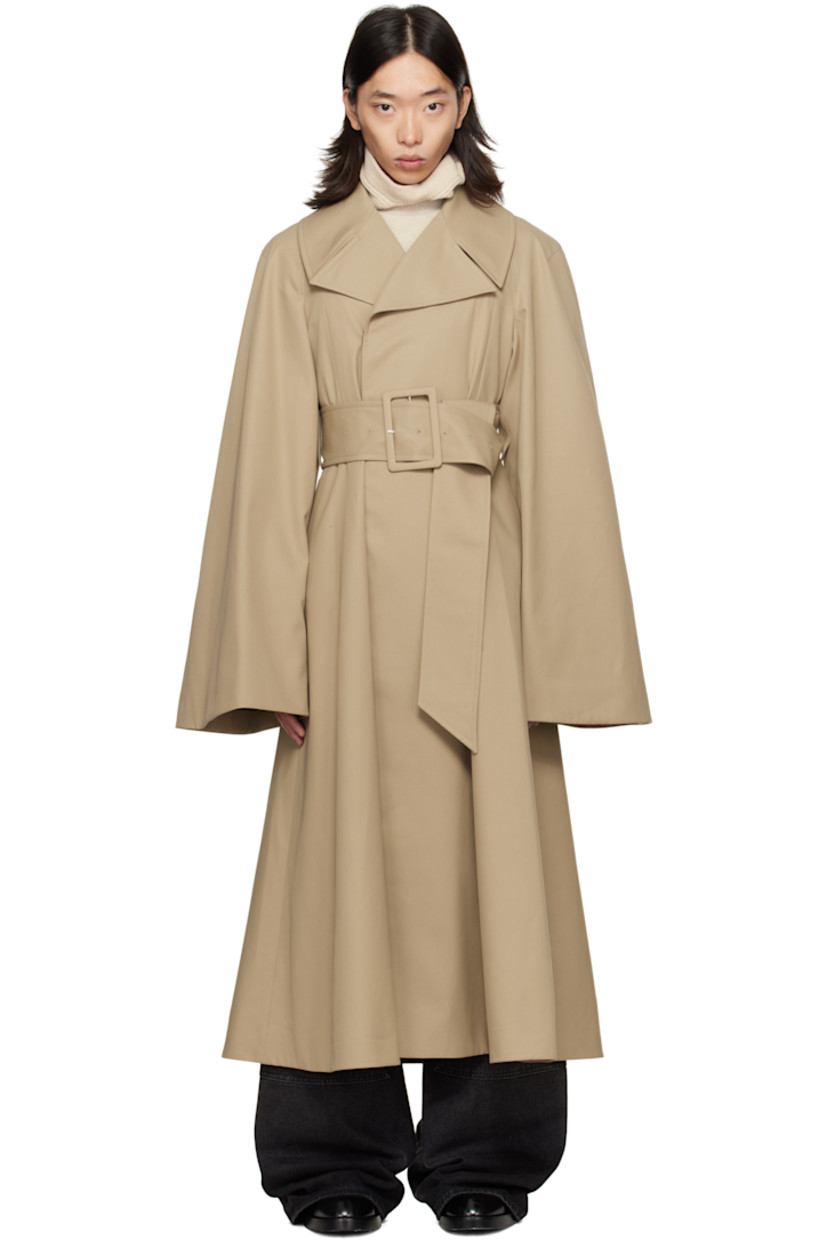 Cotton-blend gabardine trench coat.

· Notched lapel
· Concealed button closure
· Belt loops and detachable pin-buckle belt at waist
· Seam pockets
· Raglan sleeves
· Full satin lining

Supplier color: Beige