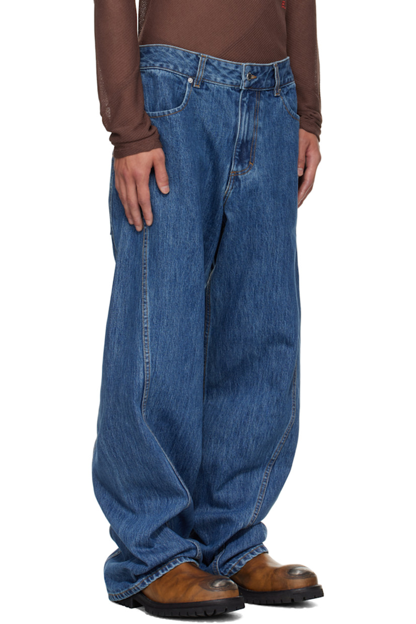 Non-stretch 14 oz denim jeans. 

· Fading throughout 
· Mid-rise
· Belt loops
· Four-pocket styling
· Zip fly 
· Curved legs  

Supplier color: Vintage indigo