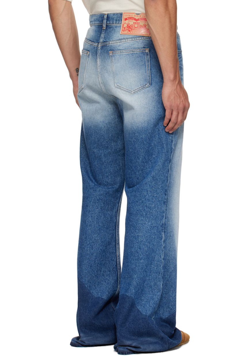 Non-stretch denim jeans.

· Fading and whiskering throughout
· Wide-leg
· Belt loops
· Press-stud belt loop
· Five-pocket styling
· Zip fly
· Logo patch at back waistband

Supplier color: Blue