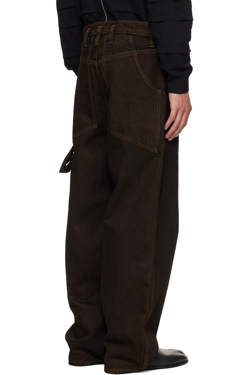 Stonewashed 14 oz non-stretch denim jeans.

· Fading throughout 
· Wide-leg 
· Belt loops
· Four-pocket styling
· Zip fly 
· Hammer loop at back pocket 
· Contrast stitching in beige

Supplier color: Mud