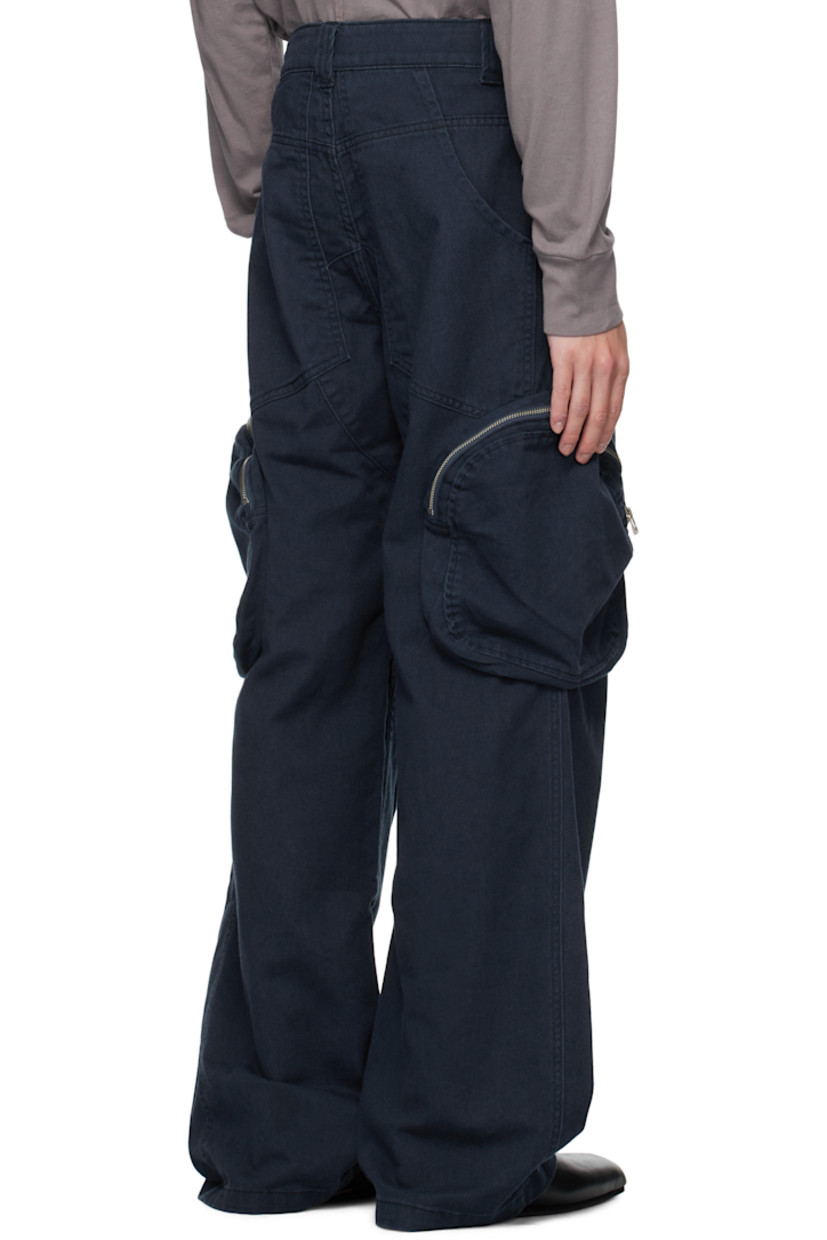 Non-stretch denim cargo pants.

· Belt loops
· Four-pocket styling
· Zip fly 
· Zip cargo pockets at outseams
· Darts at legs

Supplier color: Ocean