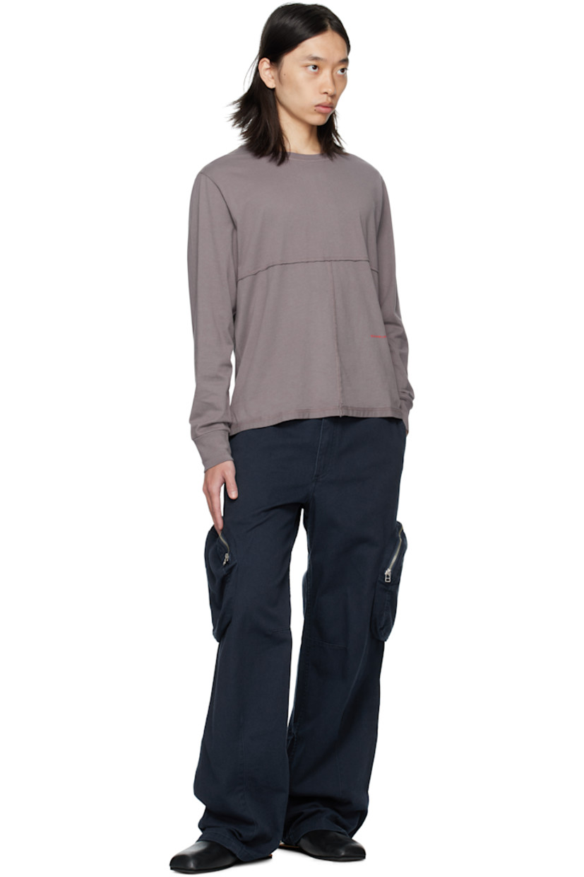 Non-stretch denim cargo pants.

· Belt loops
· Four-pocket styling
· Zip fly 
· Zip cargo pockets at outseams
· Darts at legs

Supplier color: Ocean