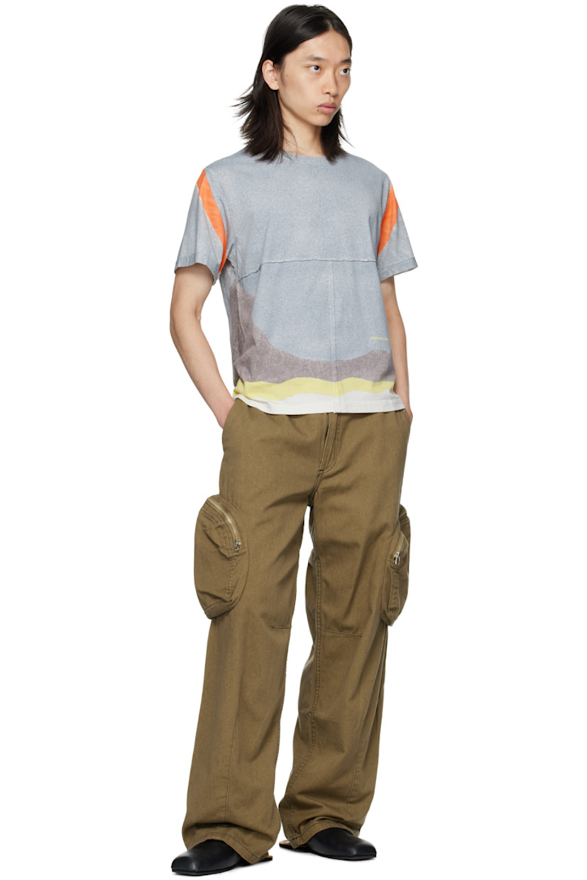 Non-stretch denim cargo pants.

· Paneled construction
· Belt loops
· Four-pocket styling
· Zip fly 
· Darts at legs
· Cargo pocket at outseams
· Contrast stitching in black

Supplier color: Earth