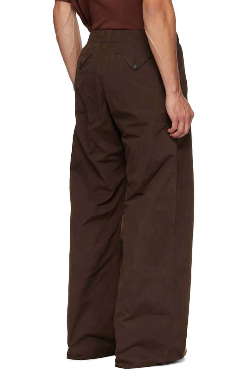Cotton-blend canvas trousers.

· Concealed drawstring at elasticized waistband
· Four-pocket styling

Supplier color: Brown