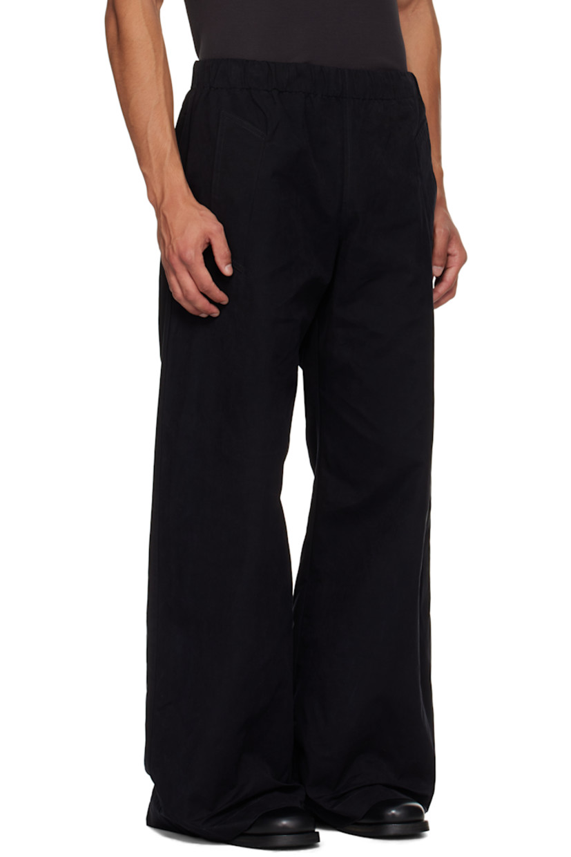 Cotton-blend broadcloth track pants.

· Concealed drawstring at elasticized waistband
· Four-pocket styling

Supplier color: Black
