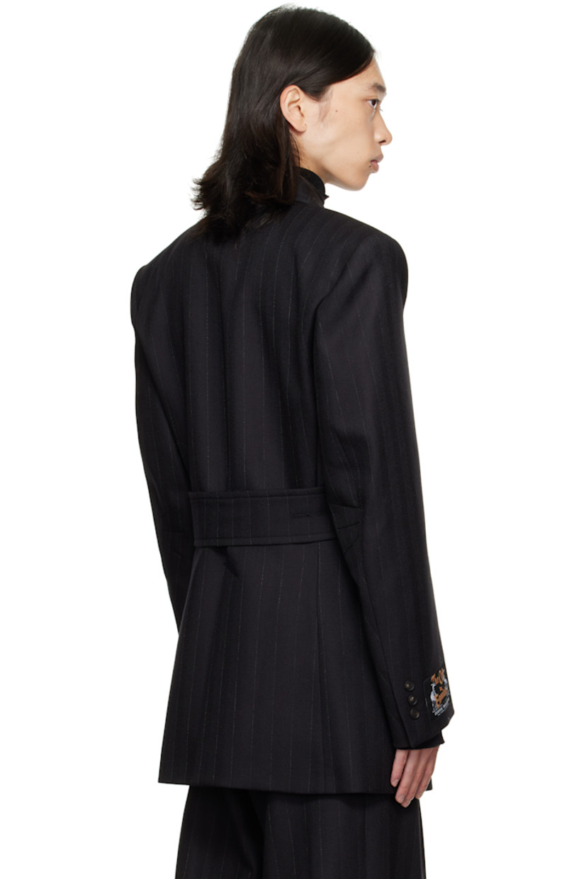 Virgin wool herringbone blazer.

· Peaked lapel
· Double-breasted button closure
· Flap pockets at front
· Padded shoulders
· Logo patch at cuff
· Surgeon's cuffs
· Button strap at back
· Central vent at back hem
· Welt pockets at interior
· Full satin lining

Supplier color: Black