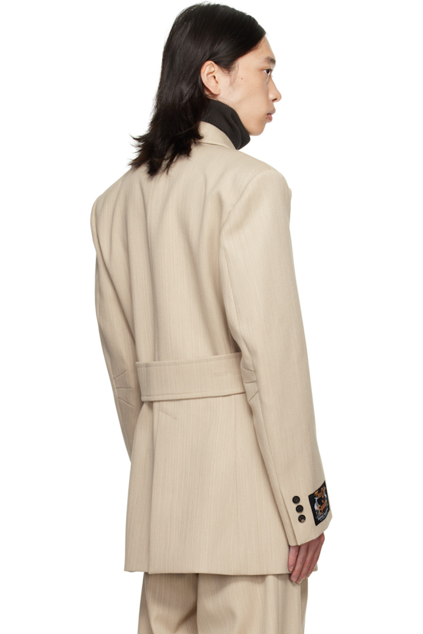 Virgin wool canvas blazer.

· Peaked lapel
· Double-breasted button closure
· Flap pockets at front
· Padded shoulders
· Logo patch at cuff
· Surgeon's cuffs
· Button strap at back
· Central vent at back hem
· Welt pockets at interior
· Full satin lining

Supplier color: Beige