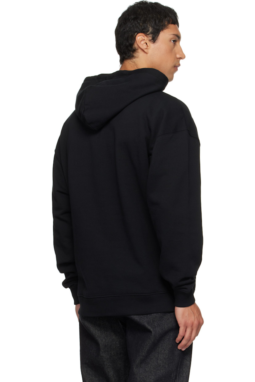 Organic cotton fleece hoodie.

· Drawstring at hood
· Graphic and logo printed at chest
· Kangaroo pocket
· Rib-knit hem and cuffs
· Dropped shoulders
· Text and logo graphic printed at back

Supplier color: Black