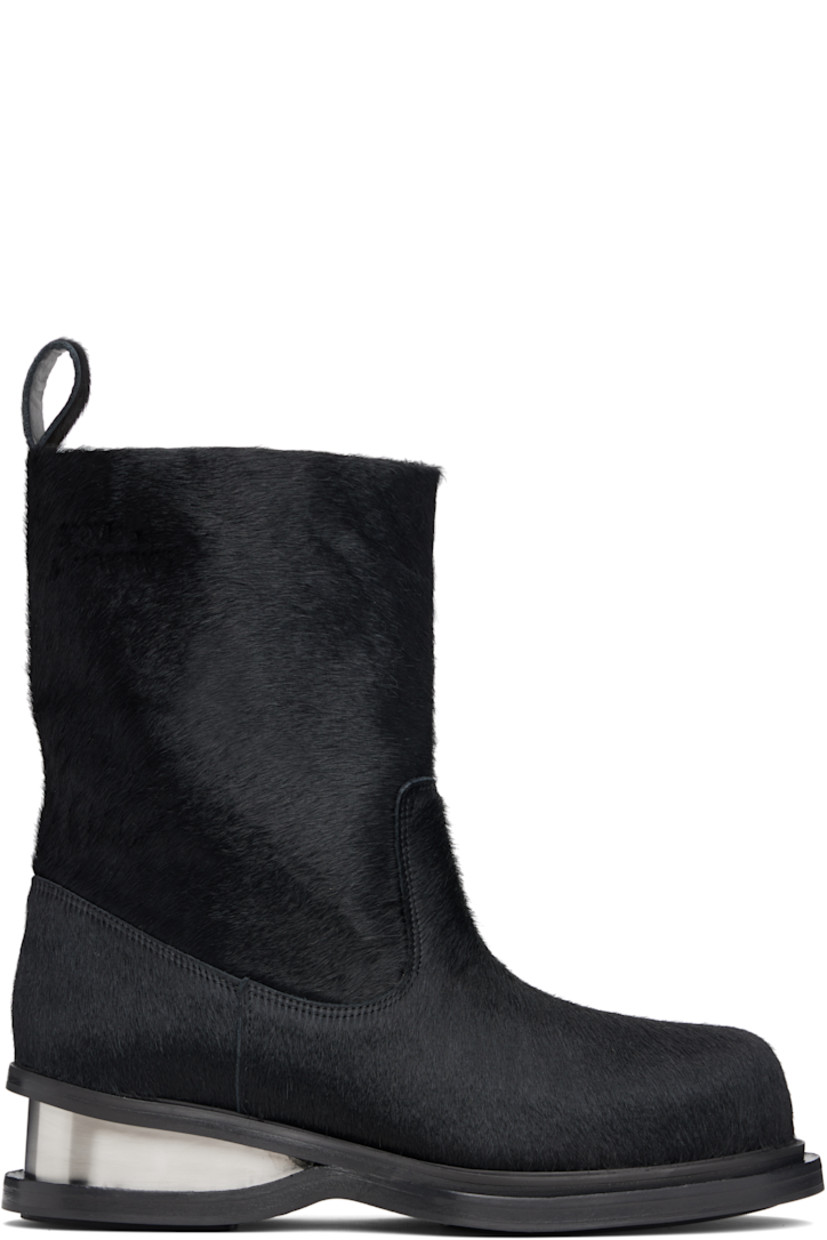 Ankle-high hair-on leather boots.

· Leather logo patch at outer side
· Pull-loop at heel collar
· Metal heel
· Leather sole with rubber injections
· Heel: H2"

Supplier color: Black