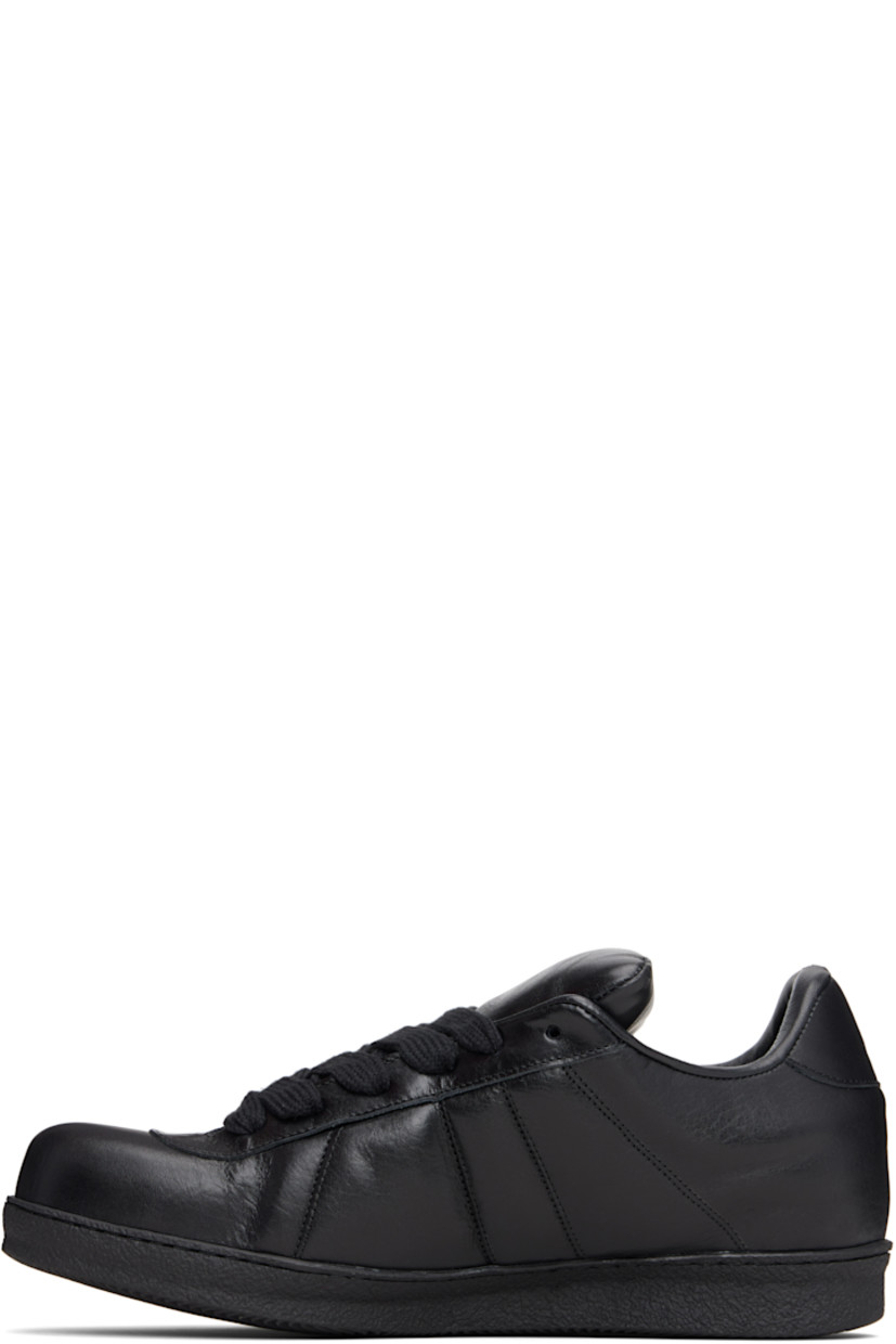 Low-top grained leather sneakers.

· Lace-up closure
· Padded tongue and collar
· Treaded rubber sole

Supplier color: Black