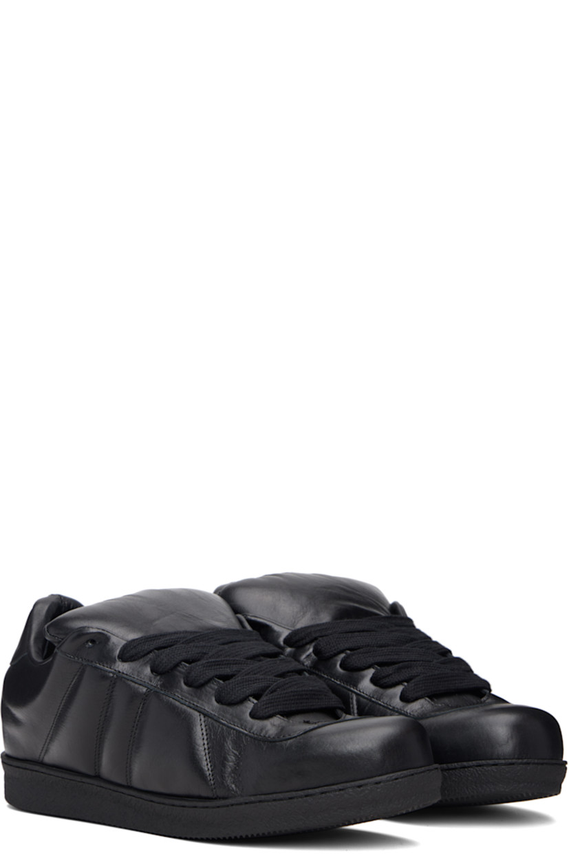 Low-top grained leather sneakers.

· Lace-up closure
· Padded tongue and collar
· Treaded rubber sole

Supplier color: Black