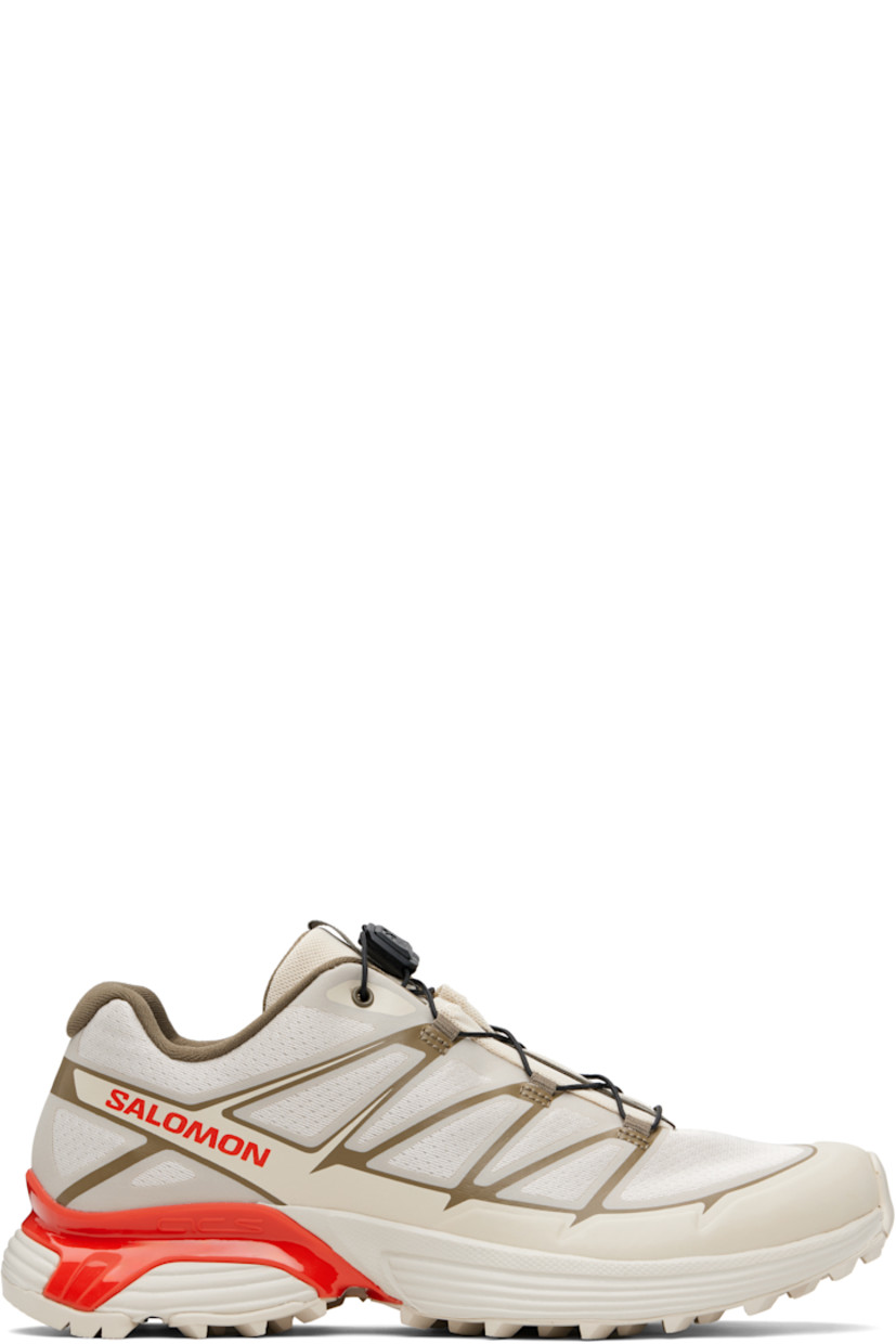 Low-top mesh sneakers.

· Bonded trim throughout
· Quicklace™ closure
· Logo patch at vamp
· Logo-woven pull-loop at tongue
· Padded tongue and collar
· Logo printed at outer side
· Bonded SensiFit™ panel at sides
· Molded OrthoLite® footbed
· Mesh lining
· Agile Chassis™ Skeleton at EnergyCell midsole
· Treaded Mud Contagrip® rubber sole

Supplier color: Rainy day/Stone gray/Cherry tomato