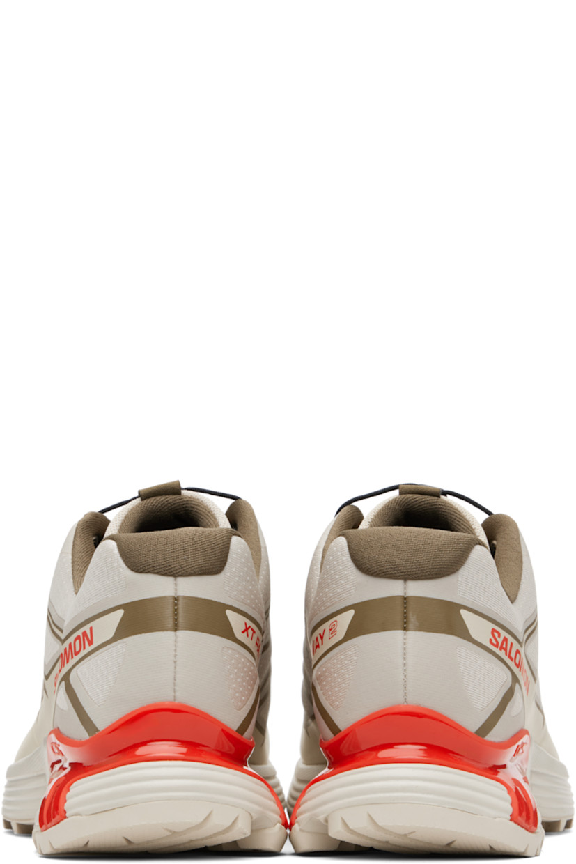 Low-top mesh sneakers.

· Bonded trim throughout
· Quicklace™ closure
· Logo patch at vamp
· Logo-woven pull-loop at tongue
· Padded tongue and collar
· Logo printed at outer side
· Bonded SensiFit™ panel at sides
· Molded OrthoLite® footbed
· Mesh lining
· Agile Chassis™ Skeleton at EnergyCell midsole
· Treaded Mud Contagrip® rubber sole

Supplier color: Rainy day/Stone gray/Cherry tomato