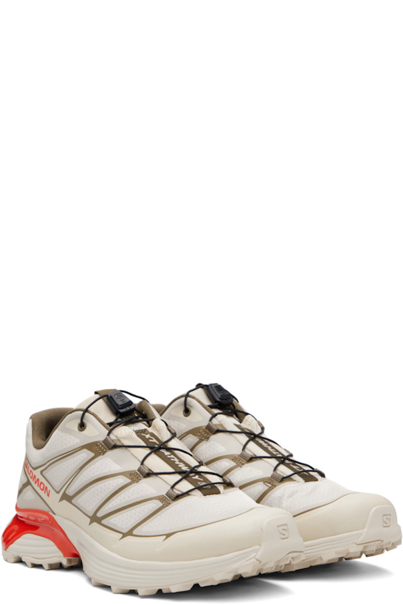 Low-top mesh sneakers.

· Bonded trim throughout
· Quicklace™ closure
· Logo patch at vamp
· Logo-woven pull-loop at tongue
· Padded tongue and collar
· Logo printed at outer side
· Bonded SensiFit™ panel at sides
· Molded OrthoLite® footbed
· Mesh lining
· Agile Chassis™ Skeleton at EnergyCell midsole
· Treaded Mud Contagrip® rubber sole

Supplier color: Rainy day/Stone gray/Cherry tomato
