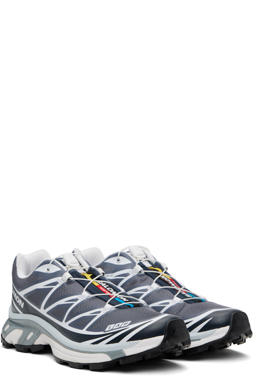 Low-top mesh sneakers.

· Bonded trim throughout
· Logo embossed at toe
· Quicklace™ closure
· Logo patch at vamp
· Logo-woven pull-loop at tongue
· Padded tongue and collar
· Bonded sensiFIT™ panel at sides
· Logo printed at outer side
· Molded OrthoLite® insole
· EndoFit™ mesh lining
· Agile Chassis™ System at EnergyCell midsole
· Treaded Mud Contagrip® rubber sole

Supplier color: Grisaille/Blue nights/Quarry
