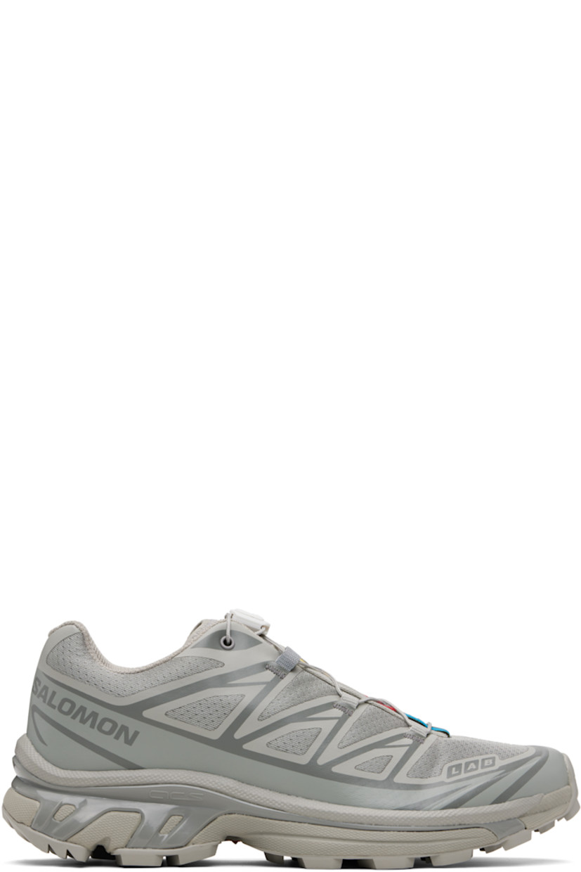 Low-top mesh sneakers.

· Bonded trim throughout
· Logo embossed at toe
· Quicklace™ closure
· Logo patch at vamp
· Logo-woven pull-loop at tongue
· Padded tongue and collar
· Bonded sensiFIT™ panel at sides
· Logo printed at outer side
· Molded OrthoLite® insole
· EndoFit™ mesh lining
· Agile Chassis™ System at EnergyCell midsole
· Treaded Mud Contagrip® rubber sole

Supplier color: Ghost gray/Ghost gray/Gray flannel