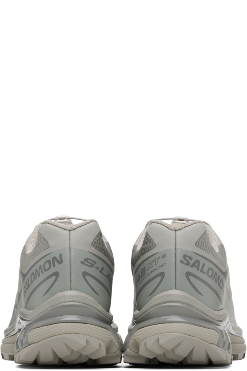 Low-top mesh sneakers.

· Bonded trim throughout
· Logo embossed at toe
· Quicklace™ closure
· Logo patch at vamp
· Logo-woven pull-loop at tongue
· Padded tongue and collar
· Bonded sensiFIT™ panel at sides
· Logo printed at outer side
· Molded OrthoLite® insole
· EndoFit™ mesh lining
· Agile Chassis™ System at EnergyCell midsole
· Treaded Mud Contagrip® rubber sole

Supplier color: Ghost gray/Ghost gray/Gray flannel