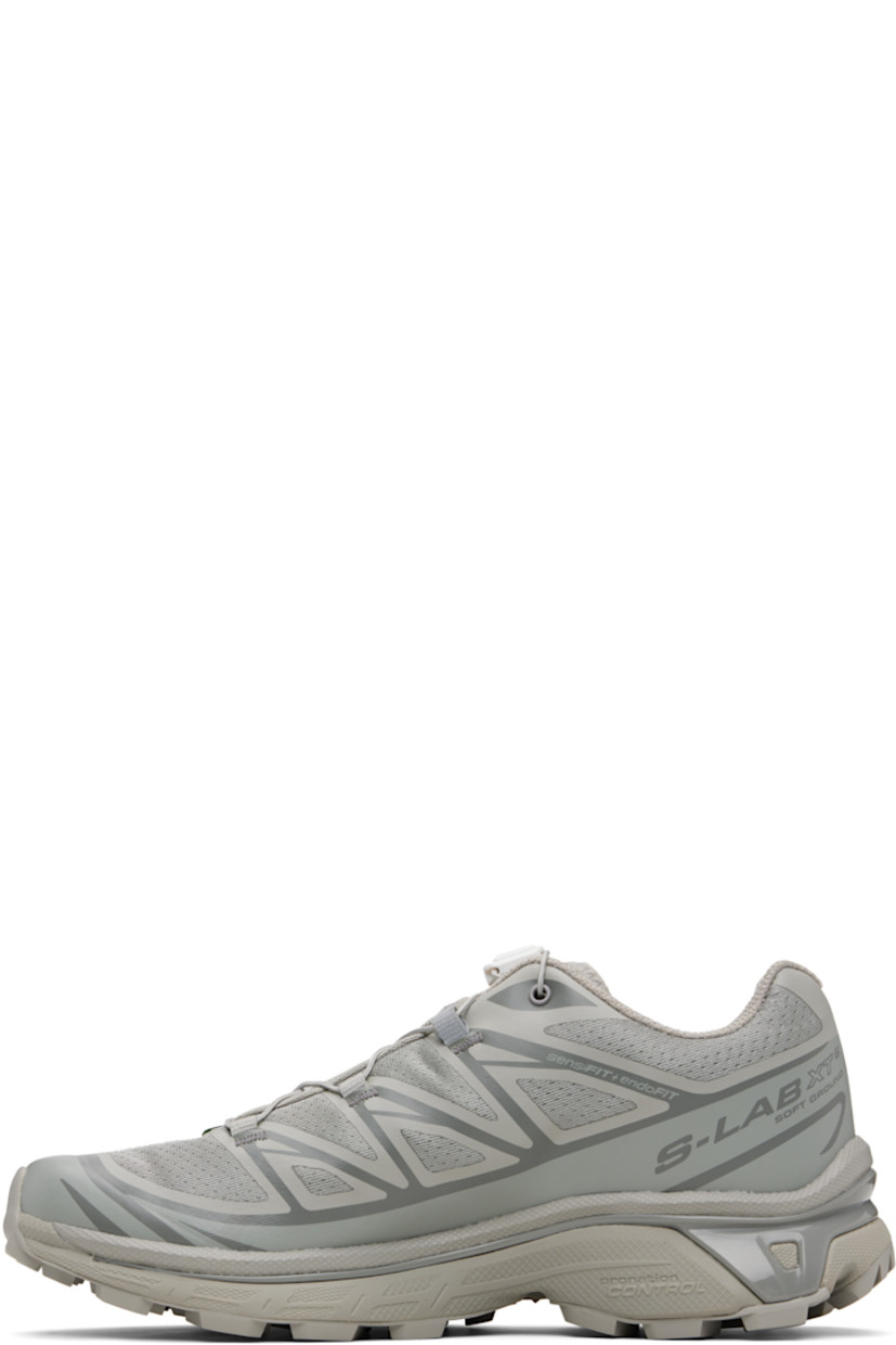 Low-top mesh sneakers.

· Bonded trim throughout
· Logo embossed at toe
· Quicklace™ closure
· Logo patch at vamp
· Logo-woven pull-loop at tongue
· Padded tongue and collar
· Bonded sensiFIT™ panel at sides
· Logo printed at outer side
· Molded OrthoLite® insole
· EndoFit™ mesh lining
· Agile Chassis™ System at EnergyCell midsole
· Treaded Mud Contagrip® rubber sole

Supplier color: Ghost gray/Ghost gray/Gray flannel