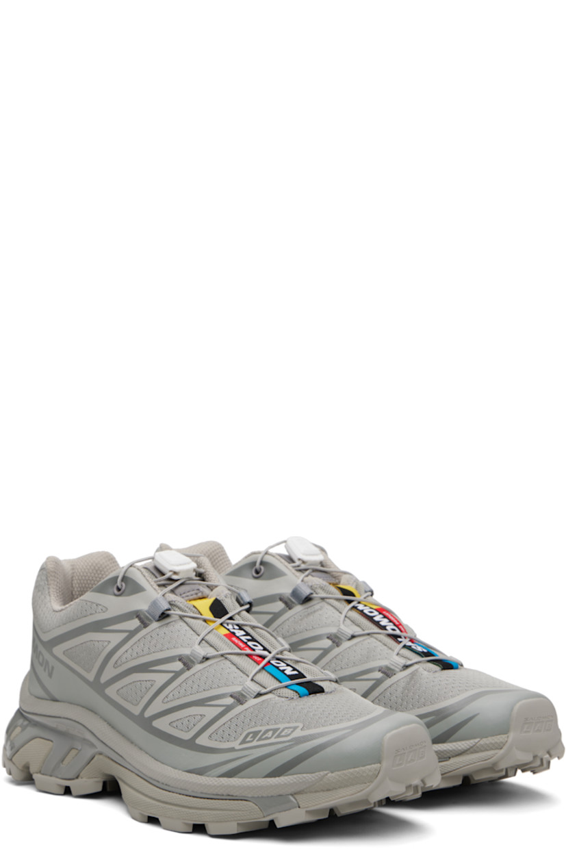 Low-top mesh sneakers.

· Bonded trim throughout
· Logo embossed at toe
· Quicklace™ closure
· Logo patch at vamp
· Logo-woven pull-loop at tongue
· Padded tongue and collar
· Bonded sensiFIT™ panel at sides
· Logo printed at outer side
· Molded OrthoLite® insole
· EndoFit™ mesh lining
· Agile Chassis™ System at EnergyCell midsole
· Treaded Mud Contagrip® rubber sole

Supplier color: Ghost gray/Ghost gray/Gray flannel