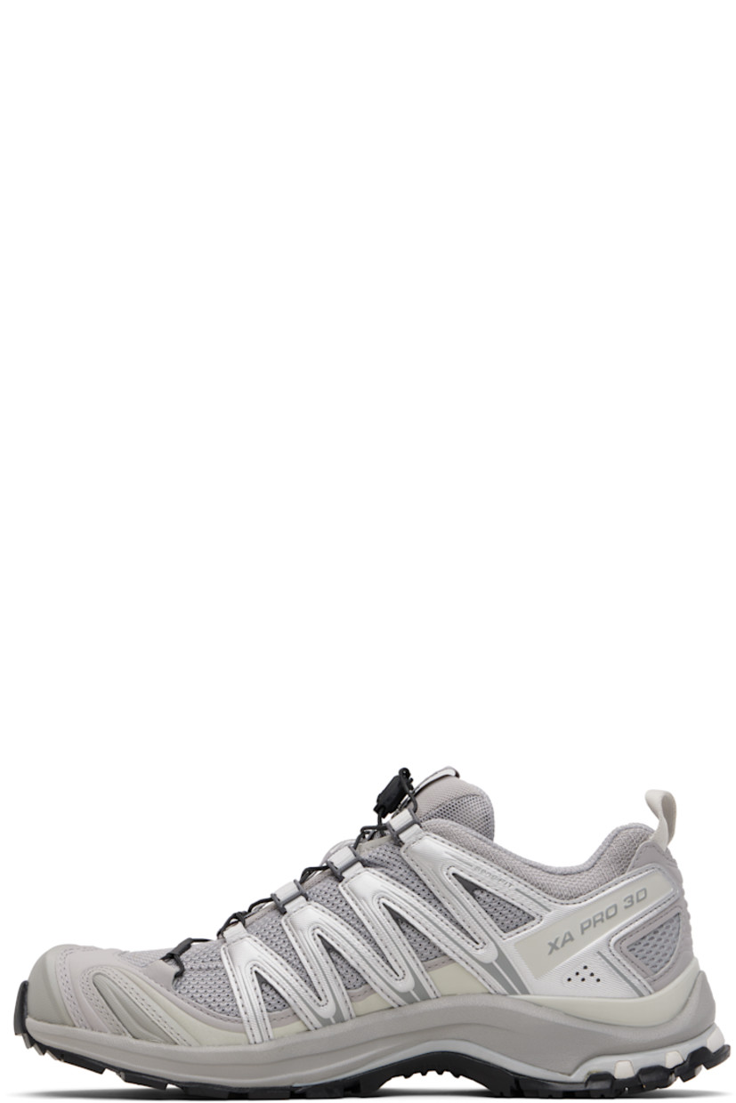 Low-top 3D mesh and faux-leather sneakers.

· Logo-embossed rubber cap toe
· Quicklace® closure
· Logo patch at vamp
· Logo-woven pull-loop at padded tongue
· Padded collar
· Logo-embossed sensiFIT™ panel at sides
· Twisted pull-loop at heel tab
· Molded OrthoLite® footbed
· Mesh lining
· 3D Advanced Chassis™ System at foam rubber midsole
· Treaded All Terrain Contagrip® rubber sole

Supplier color: Alloy/Ftw silver/Lunar rock