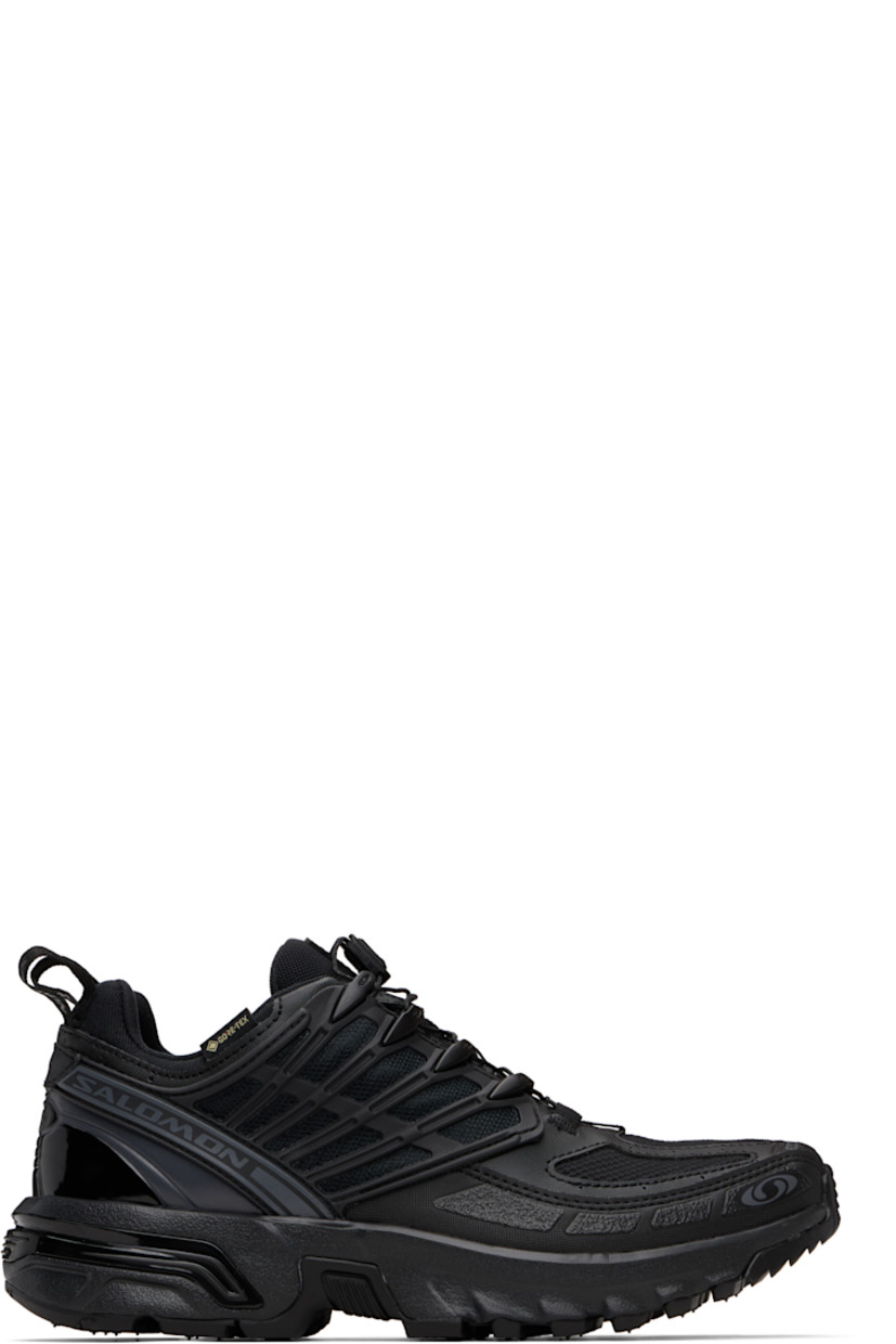 Low-top GORE-TEX™ faux-leather and anti-debris mesh sneakers.

· PFC-free waterproof
· Logos bonded throughout
· Quicklace® closure
· Logo patch at vamp
· Velcro tab and logo patch at padded tongue
· Padded collar
· sensiFIT™ panel at sides
· Logo flag at outer side
· Pull-loops at heel tab
· Logo embossed at heel counter
· Molded OrthoLite® footbed
· Mesh lining
· Agile Chassis™ System at foam rubber EnergyCell midsole
· Treaded All Terrain Contagrip® rubber sole

Supplier color: Black/Black/Asphalt