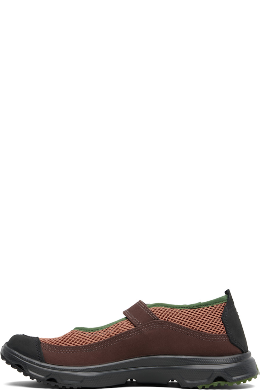 Mesh and nubuck Mary Jane-style low-top sneakers.

· Paneled construction
· Logo embossed at toe
· Pin-buckle strap at vamp
· Pull-tab at heel collar
· Logo embossed at heel tab
· Collapsible heel counter
· Faux-suede lining
· Molded rubber footbed
· Treaded Contagrip® rubber sole

Supplier color: Russet/Black/Roa