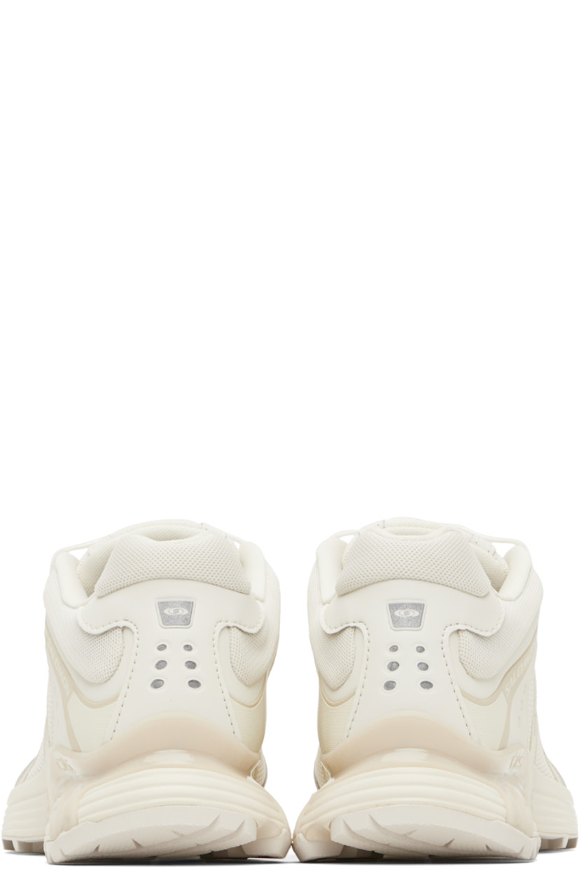 Low-top anti-debris 3D mesh and faux-leather sneakers.

· Reflective trim throughout
· Perforations and embossed logo at toe
· Quicklace™ closure
· Logo patch at padded tongue
· Padded collar
· Bonded sensiFIT™ panel at sides
· Logo printed at outer side and heel tab
· Molded OrthoLite® footbed
· Mesh lining
· Agile Chassis™ System at foam rubber EnergyCell midsole
· Treaded Mud Contagrip® rubber sole

Supplier color: Vanilla ice/Almond milk/Vanilla ice
