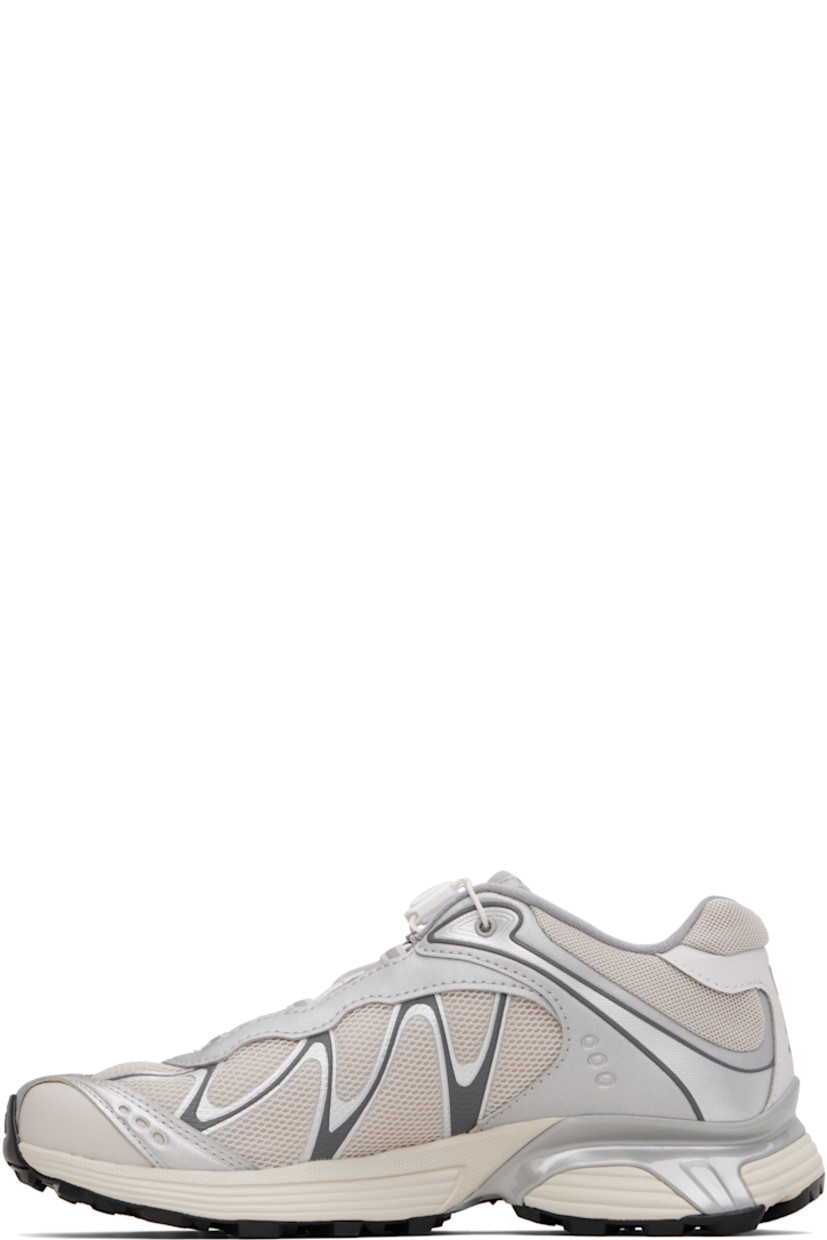 Low-top anti-debris 3D mesh and faux-leather sneakers.

· Reflective trim throughout
· Perforations and embossed logo at toe
· Quicklace™ closure
· Logo patch at padded tongue
· Padded collar
· Bonded sensiFIT™ panel at sides
· Logo printed at outer side and heel tab
· Molded OrthoLite® footbed
· Mesh lining
· Agile Chassis™ System at foam rubber EnergyCell midsole
· Treaded Mud Contagrip® rubber sole

Supplier color: Ftw silver/Lunar rock/Silver cloud