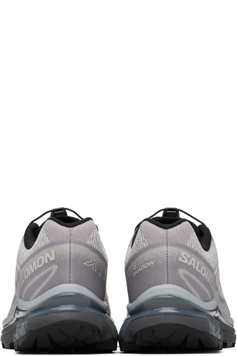 Low-top mesh sneakers. 

· Bonded trim throughout
· Quicklace® closure
· Logo patch at vamp
· Logo-woven pull-loop at padded tongue
· Padded collar
· Bonded sensiFIT™ panel at sides
· Text printed at inner side
· Logo printed at outer side
· Molded OrthoLite® footbed
· EndoFit™ mesh lining
· Agile Chassis™ System at foam rubber EnergyCell midsole
· Treaded Mud Contagrip® rubber sole

Supplier color: Gull/Gray violet/Quarry