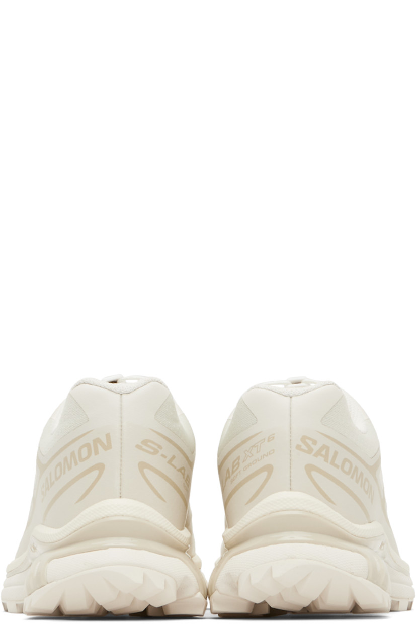 Low-top mesh sneakers.

· Bonded trim throughout
· Quicklace® closure
· Logo patch at vamp
· Logo-woven pull-loop at padded tongue
· Padded collar
· Bonded sensiFIT™ panel at sides
· Text printed at inner side
· Logo printed at outer side
· Molded OrthoLite® footbed
· EndoFit™ mesh lining
· Agile Chassis™ System at foam rubber EnergyCell midsole
· Treaded Mud Contagrip® rubber sole

Supplier color: Vanilla ice/Vanilla ice/Almond milk