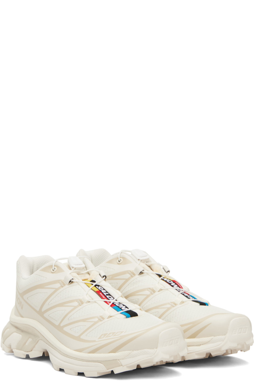 Low-top mesh sneakers.

· Bonded trim throughout
· Quicklace® closure
· Logo patch at vamp
· Logo-woven pull-loop at padded tongue
· Padded collar
· Bonded sensiFIT™ panel at sides
· Text printed at inner side
· Logo printed at outer side
· Molded OrthoLite® footbed
· EndoFit™ mesh lining
· Agile Chassis™ System at foam rubber EnergyCell midsole
· Treaded Mud Contagrip® rubber sole

Supplier color: Vanilla ice/Vanilla ice/Almond milk