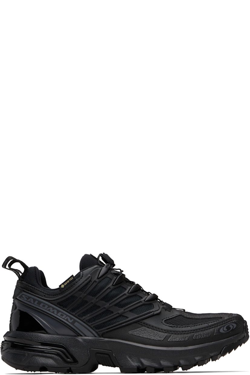 Low-top GORE-TEX™ faux-leather and anti-debris mesh sneakers.

· PFC-free waterproof
· Logos bonded throughout
· Quicklace® closure
· Logo patch at vamp
· Velcro tab and logo patch at padded tongue
· Padded collar
· sensiFIT™ panel at sides
· Logo flag at outer side
· Pull-loops at heel tab
· Logo embossed at heel counter
· Molded OrthoLite® footbed
· Mesh lining
· Agile Chassis™ System at foam rubber EnergyCell midsole
· Treaded All Terrain Contagrip® rubber sole

Supplier color: Black/Black/Asphalt