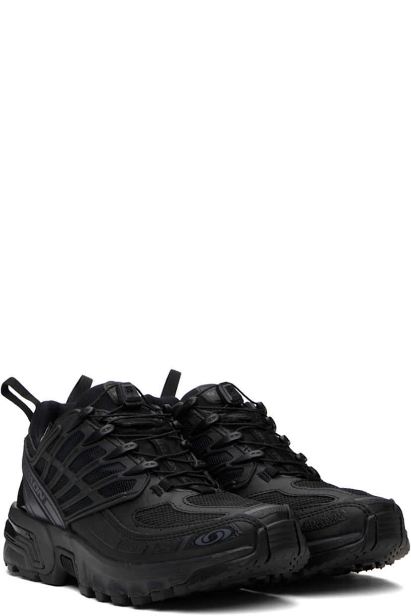 Low-top GORE-TEX™ faux-leather and anti-debris mesh sneakers.

· PFC-free waterproof
· Logos bonded throughout
· Quicklace® closure
· Logo patch at vamp
· Velcro tab and logo patch at padded tongue
· Padded collar
· sensiFIT™ panel at sides
· Logo flag at outer side
· Pull-loops at heel tab
· Logo embossed at heel counter
· Molded OrthoLite® footbed
· Mesh lining
· Agile Chassis™ System at foam rubber EnergyCell midsole
· Treaded All Terrain Contagrip® rubber sole

Supplier color: Black/Black/Asphalt