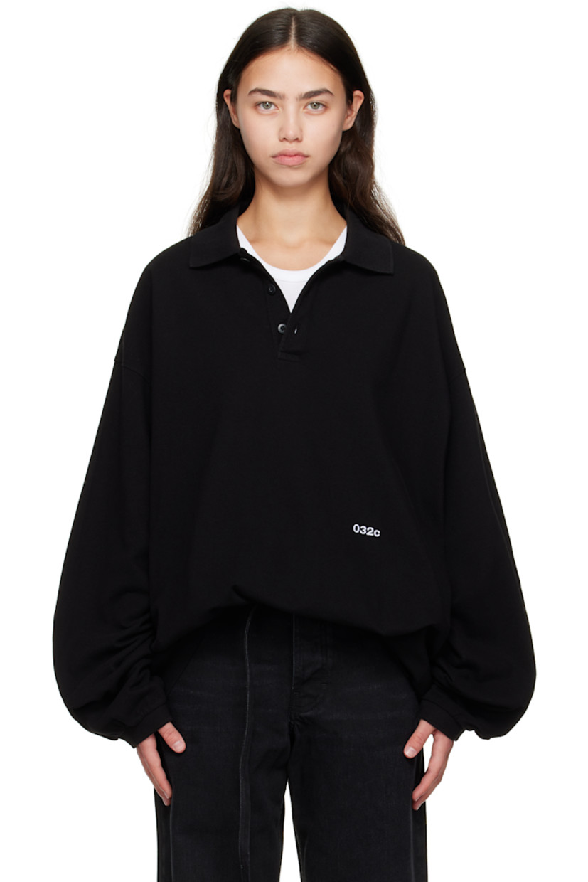 Stonewashed organic cotton piqué polo.

· Rib-knit spread collar and cuffs
· Three-button placket
· Logo embroidered at front
· Tennis-tail hem
· Dropped shoulders
· Graphic printed at back

Supplier color: Washed black