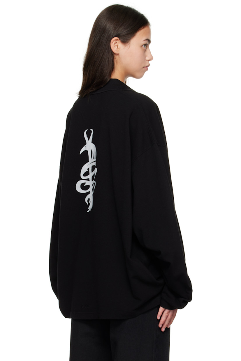 Stonewashed organic cotton piqué polo.

· Rib-knit spread collar and cuffs
· Three-button placket
· Logo embroidered at front
· Tennis-tail hem
· Dropped shoulders
· Graphic printed at back

Supplier color: Washed black