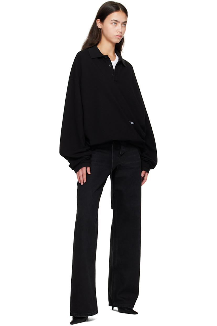 Stonewashed organic cotton piqué polo.

· Rib-knit spread collar and cuffs
· Three-button placket
· Logo embroidered at front
· Tennis-tail hem
· Dropped shoulders
· Graphic printed at back

Supplier color: Washed black