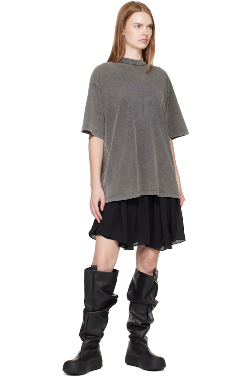 Knee-high buffed faux-leather boots.

· Gathering throughout
· Logo-embossed pull-loops at collar
· Grained faux-leather lining
· Logo-embossed rubber platform midsole
· Treaded rubber sole
· Platform: H1.75"

Supplier color: Black