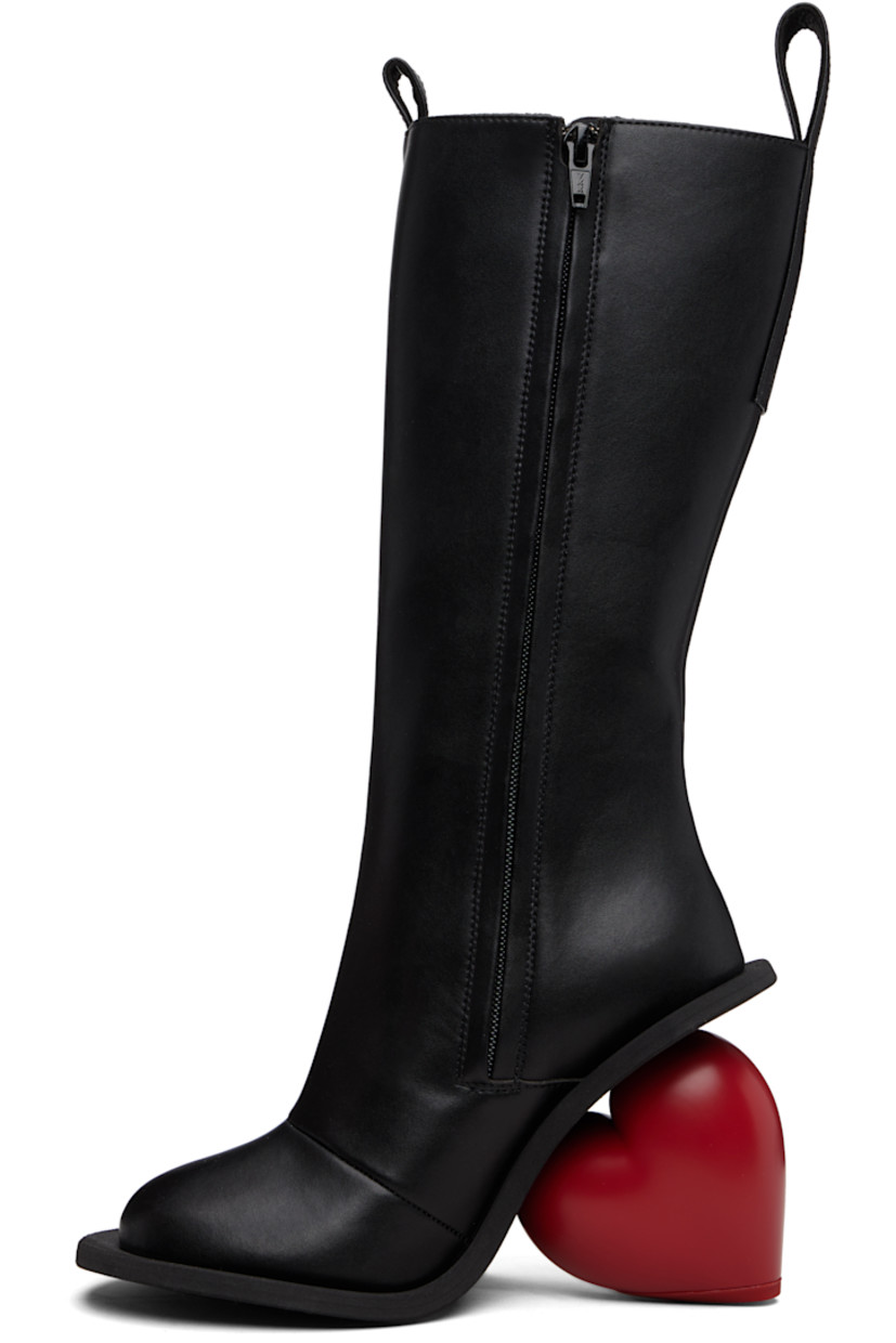Knee-high buffed recycled leather-blend boots.

· Logo-embossed pull-loops at collar
· Zip closure at inner side
· Grained faux-leather lining
· Sculptural heel
· Rubber sole
· Heel: H4.25"

Supplier color: Black