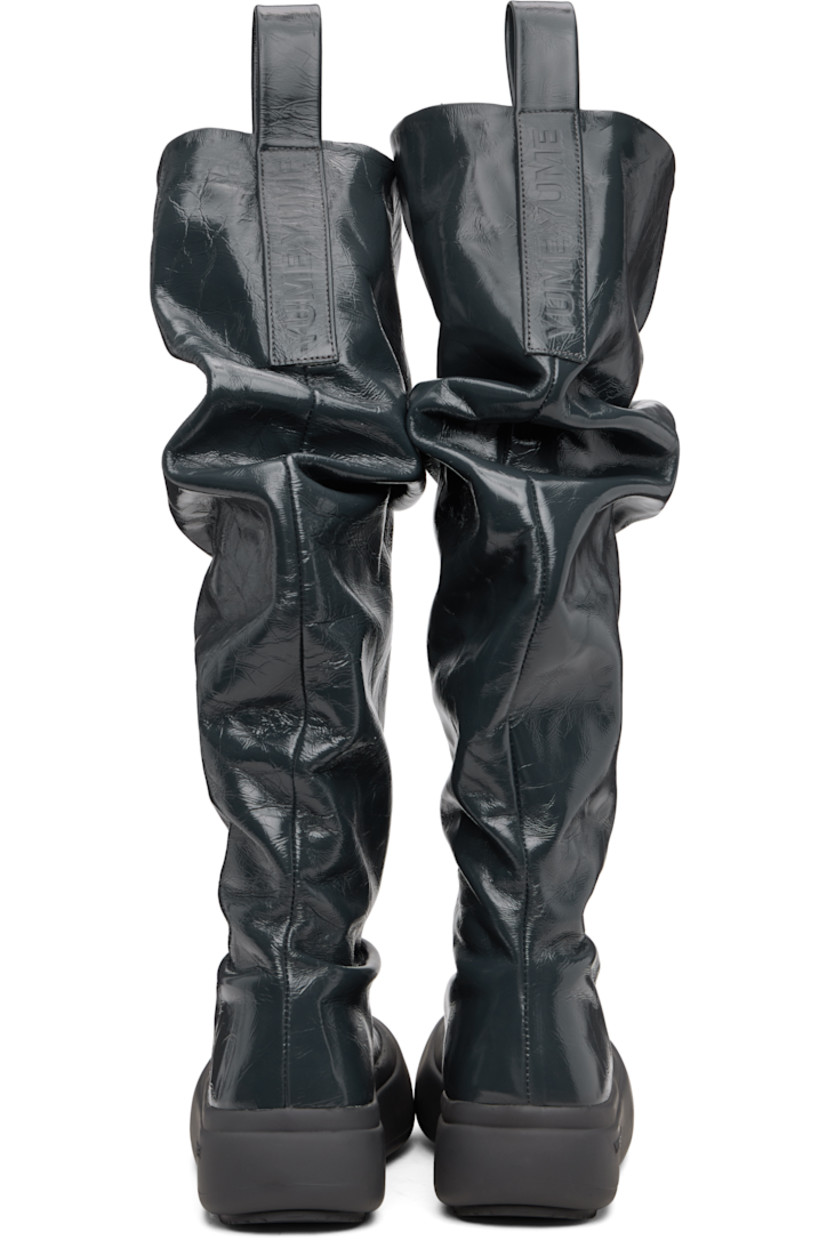 Knee-high crinkled leather boots.

· Gathering throughout
· Logo-embossed pull-loops at collar
· Grained faux-leather lining
· Logo-embossed rubber platform midsole
· Treaded rubber sole
· Platform: H1.75"

Supplier color: Wrinkled grey