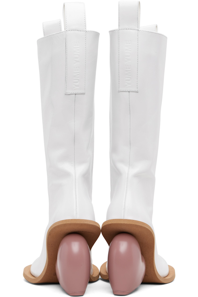 Knee-high crinkled leather boots.

· Logo-embossed pull-loops at collar
· Zip closure at inner side
· Grained faux-leather lining
· Sculptural heel
· Rubber sole
· Heel: H4.25"

Supplier color: Wrinkled white
