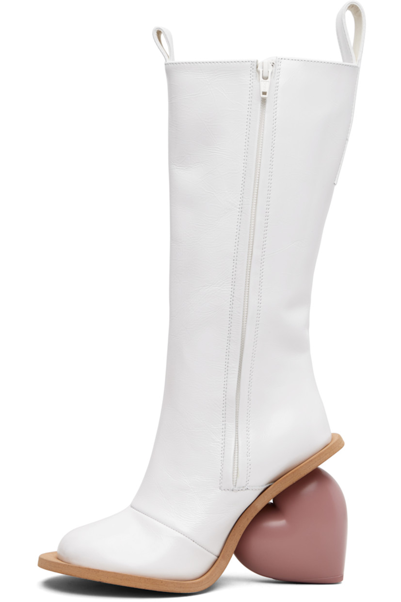 Knee-high crinkled leather boots.

· Logo-embossed pull-loops at collar
· Zip closure at inner side
· Grained faux-leather lining
· Sculptural heel
· Rubber sole
· Heel: H4.25"

Supplier color: Wrinkled white