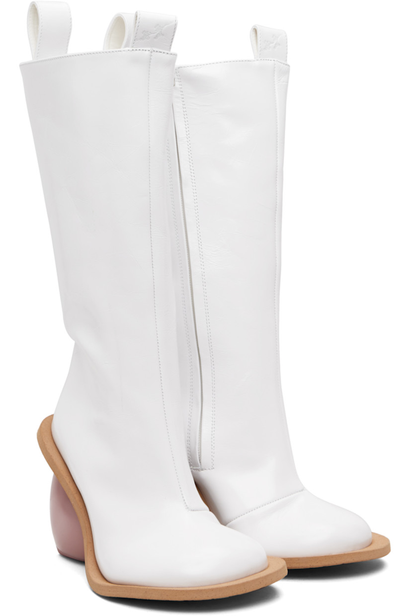 Knee-high crinkled leather boots.

· Logo-embossed pull-loops at collar
· Zip closure at inner side
· Grained faux-leather lining
· Sculptural heel
· Rubber sole
· Heel: H4.25"

Supplier color: Wrinkled white