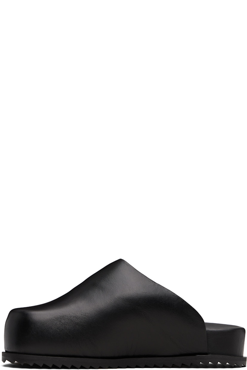 Padded buffed nappa leather slip-on loafers.

· Chrome-free leather
· Square toe
· Grained faux-leather lining
· Treaded rubber sole

Supplier color: Black
