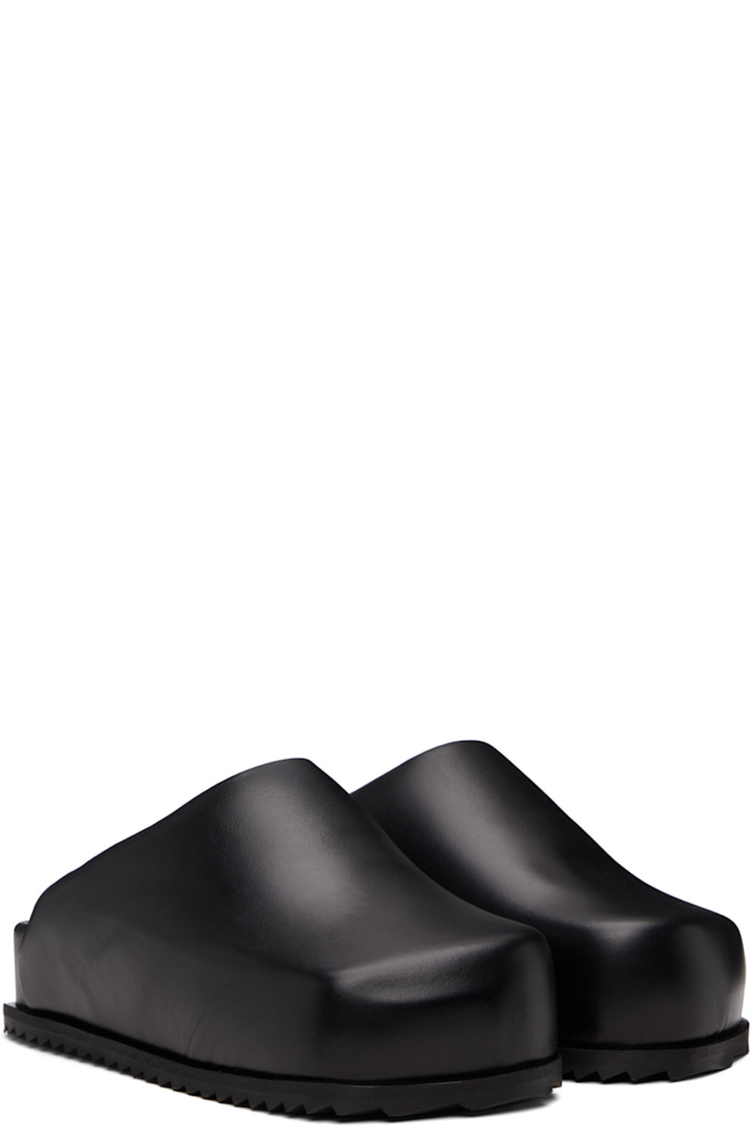Padded buffed nappa leather slip-on loafers.

· Chrome-free leather
· Square toe
· Grained faux-leather lining
· Treaded rubber sole

Supplier color: Black