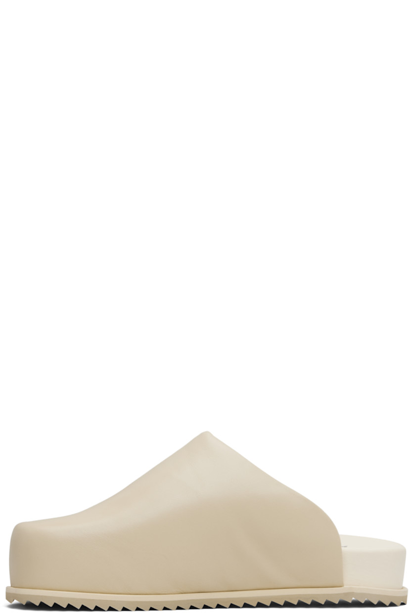 Padded buffed nappa leather slip-on loafers.

· Chrome-free leather
· Square toe
· Grained faux-leather lining
· Treaded rubber sole

Supplier color: Beige